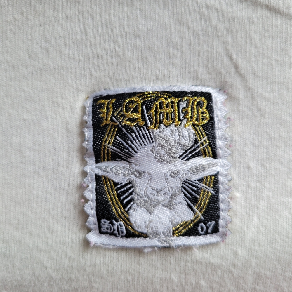 L.A.M.B. White Graphic 'Love Angel Music Baby' Short Sleeve Tee - Picture 5 of 5